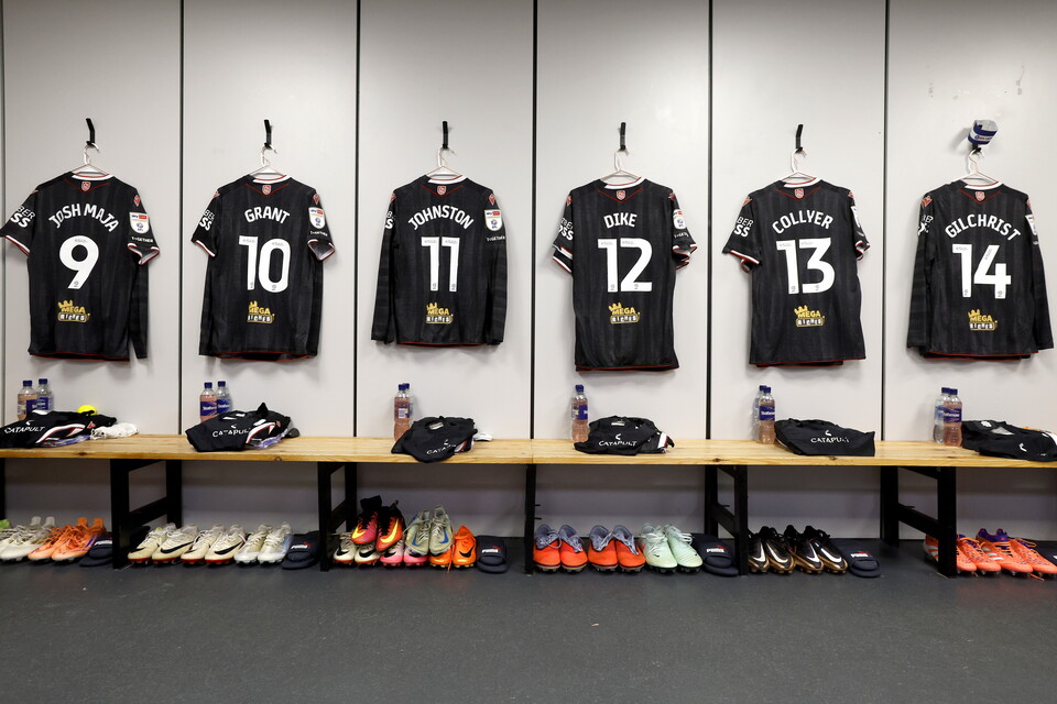 A photo of our shirts hanging up in the dressing rooms 