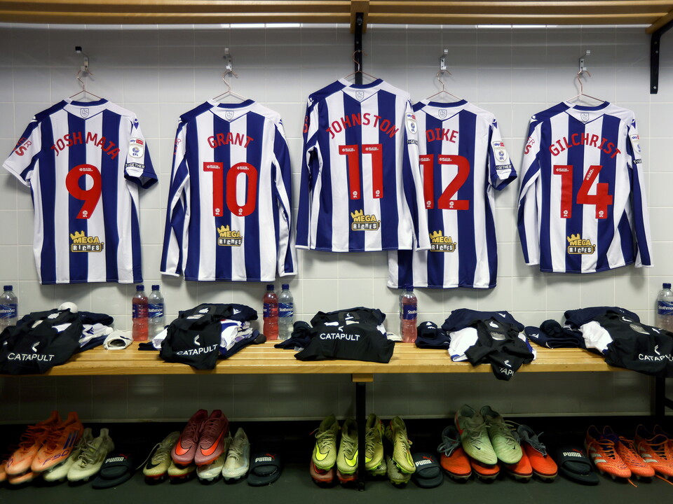 An image of Albion's blue and white shirts hanging up in the away dressing room at Hull