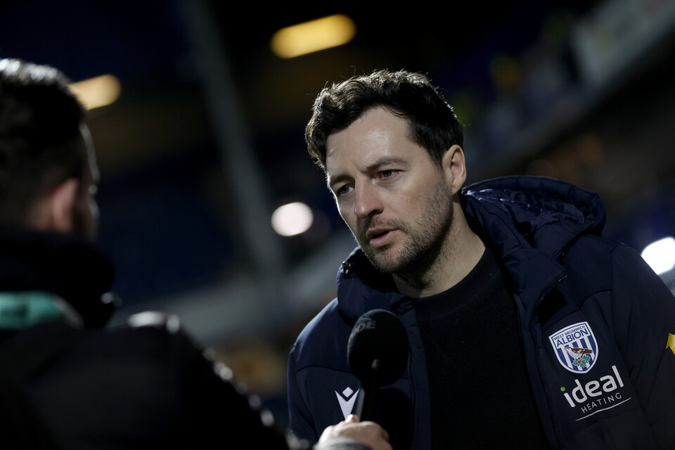 A photo of Ryan Mason doing an interview 