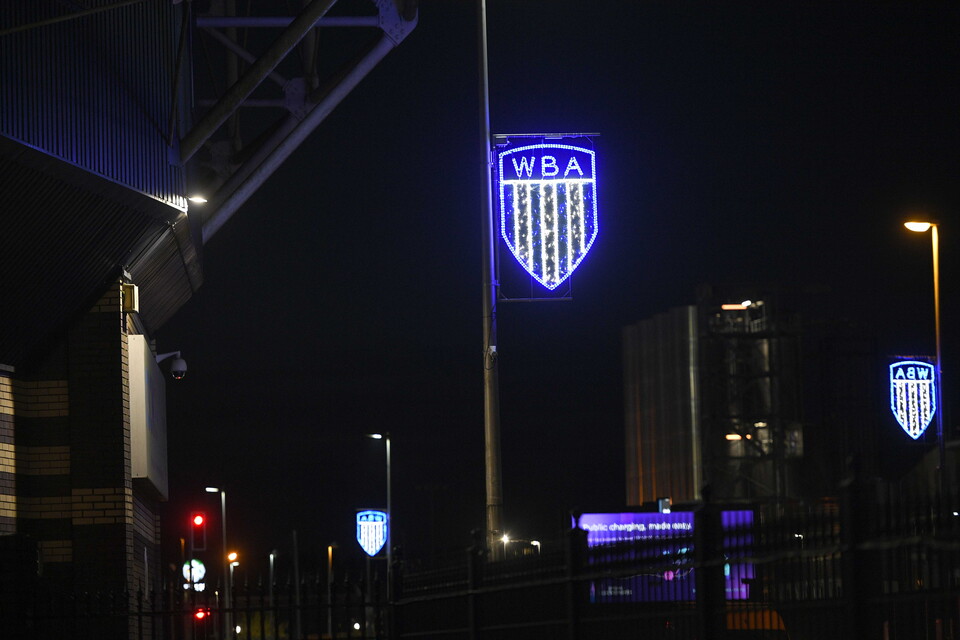 A Christmas WBA badge on a lamp outside The Hawthorns