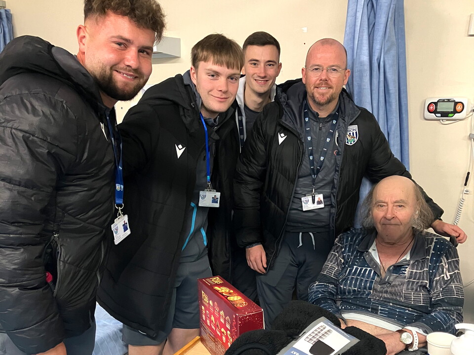 Foundation staff with a participant at a care home.