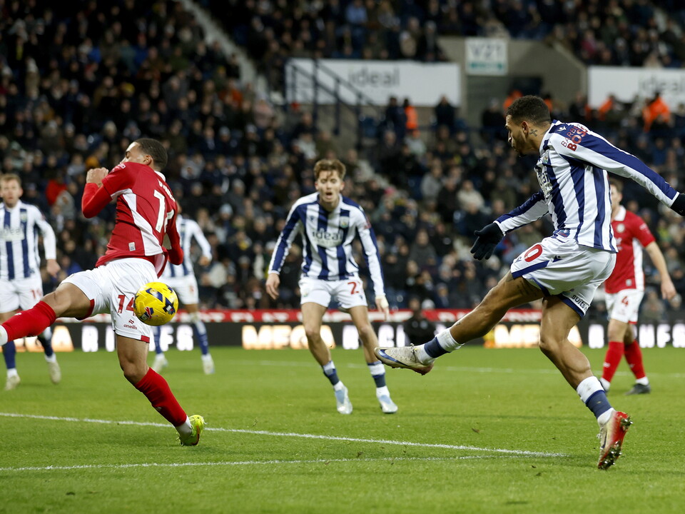 An image of Karlan Grant shooting against Bristol City