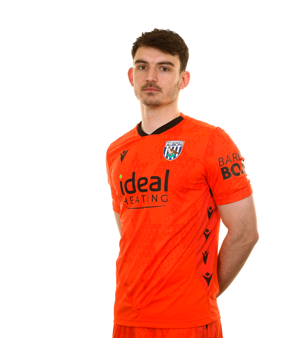 A photo of Albion goalkeeper Max O'Leary in the 2025/26 orange goalkeeper kit