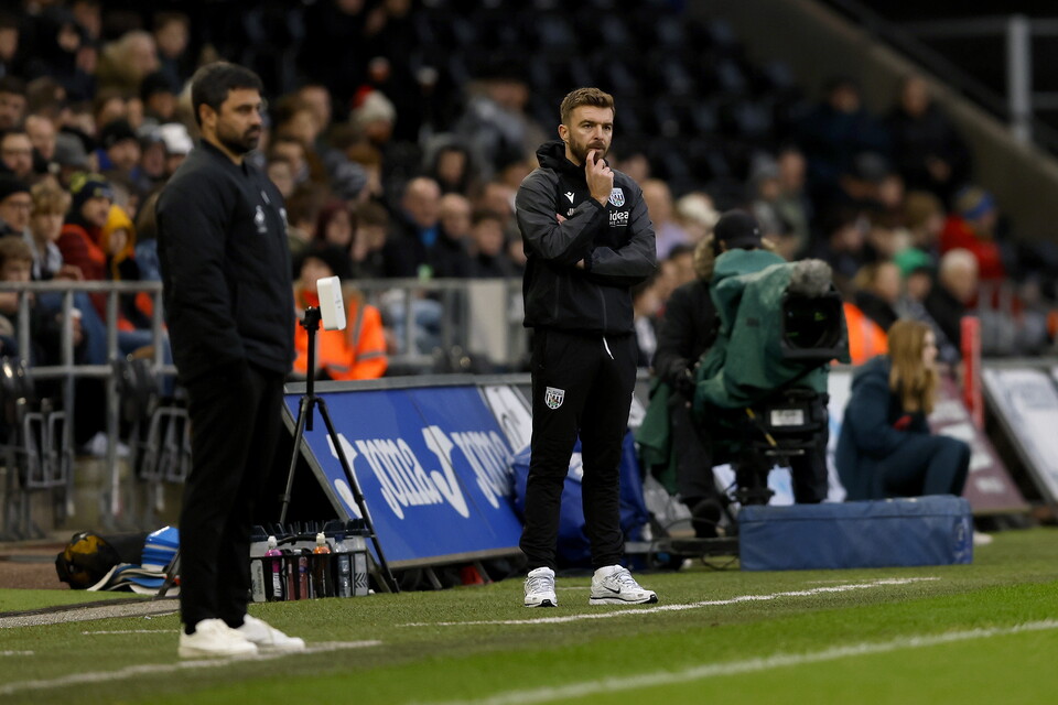 James Morrison thinking on the side of the pitch at Swansea 