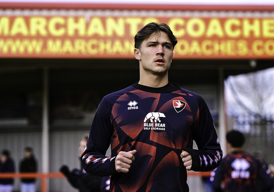 Cole Deeming warming up before a Cheltenham Town game