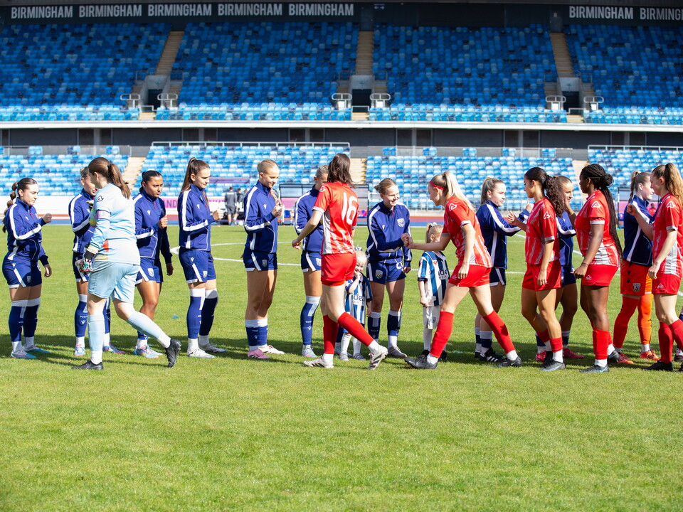 Albion shake hands with Leafield Athletic before the game.