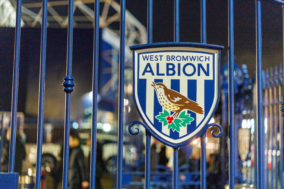 A WBA badge on the gates outside The Hawthorns 