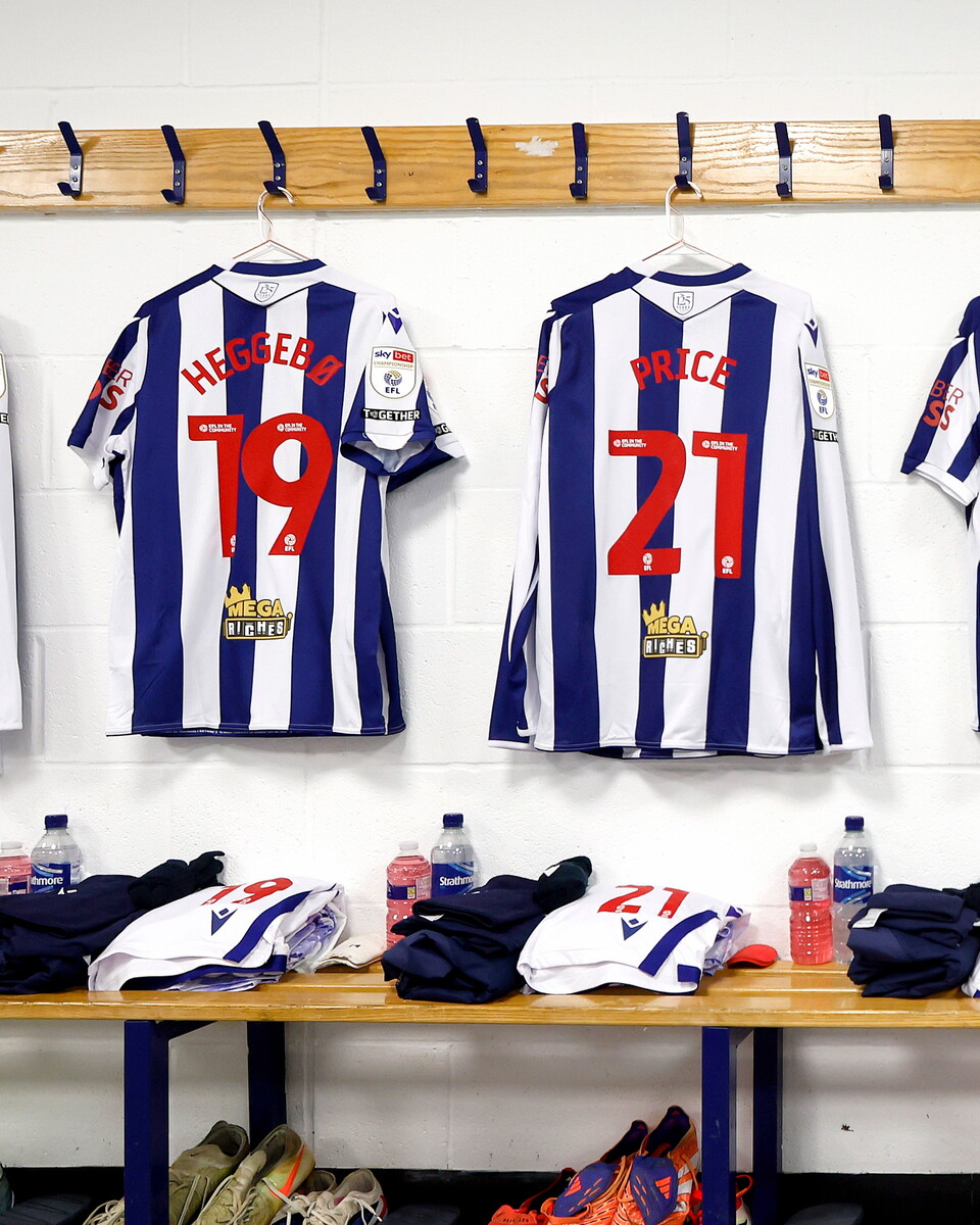 Heggebo and Price's shirts hanging up in the dressing room
