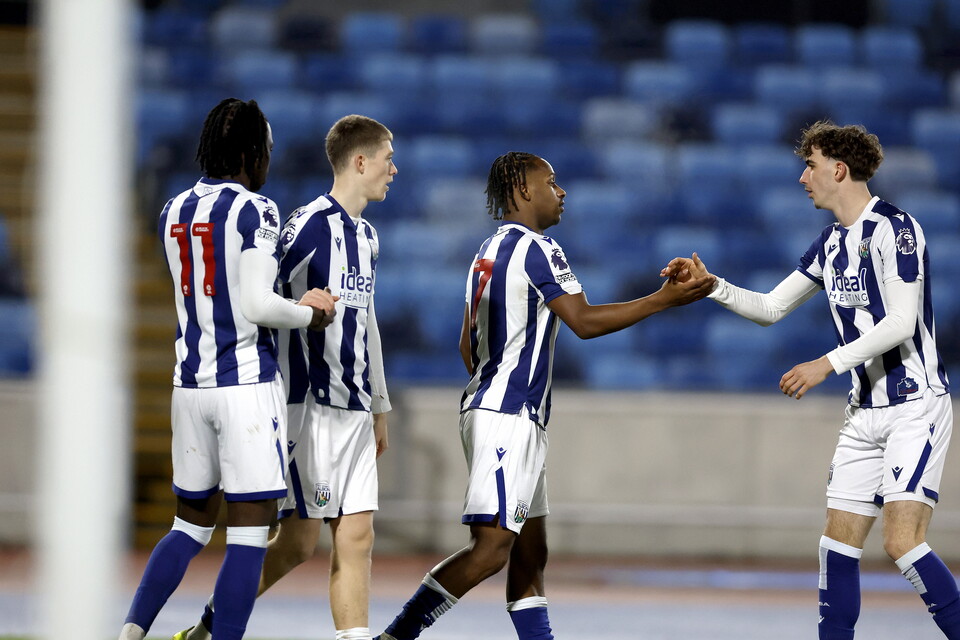 Remar McNeil celebrates scoring.