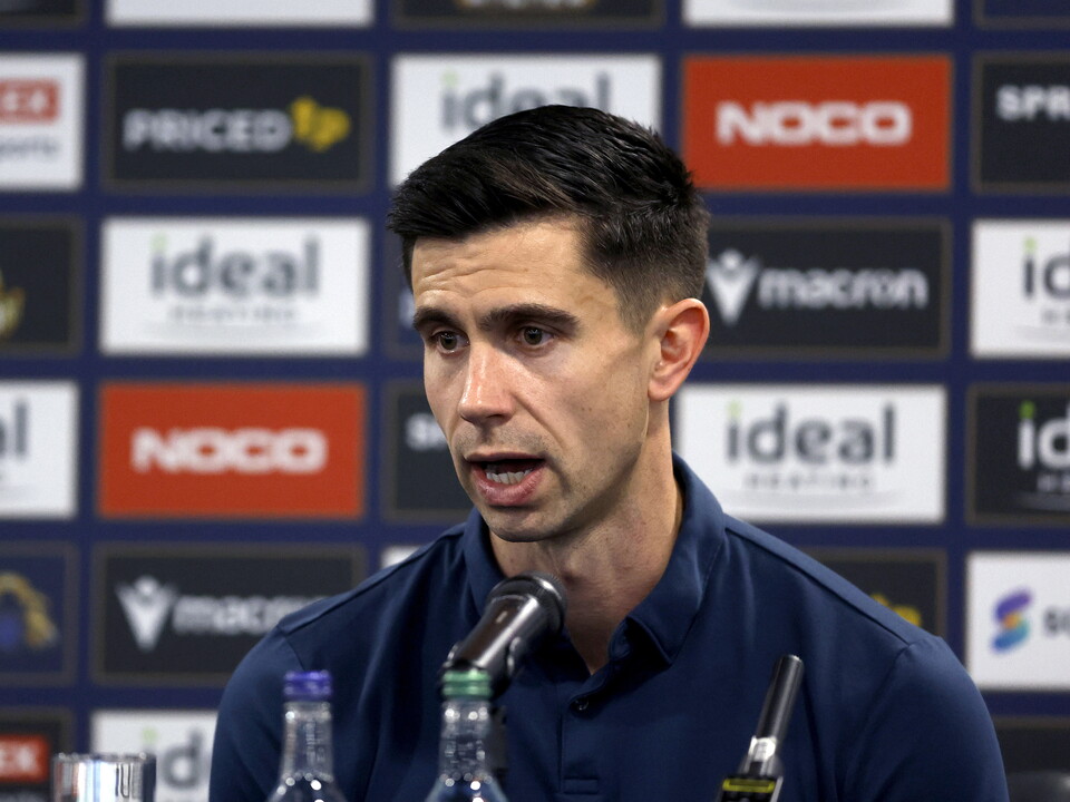 Eric Ramsay speaking in a press conference 