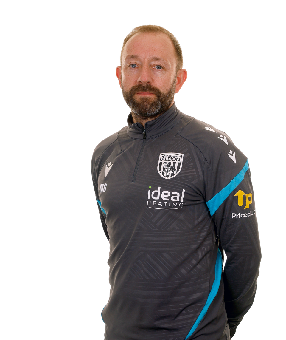 A club headshot of First Team Coach Matt Gill in the 2025/26 training kit
