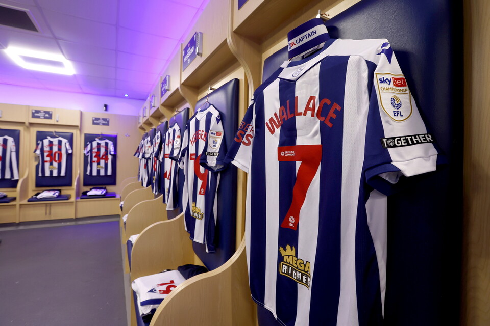 Shirts hanging up in the home dressing room