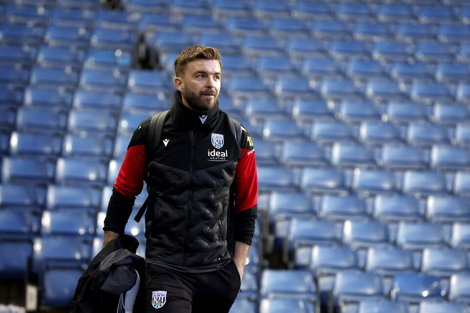 James Morrison in a WBA tracksuit arriving at The Hawthorns before a game