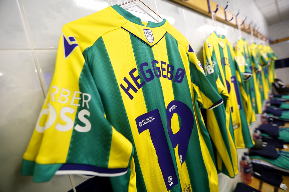 The back of Aune Heggebø's green and yellow shirt with his name and number 19 on display