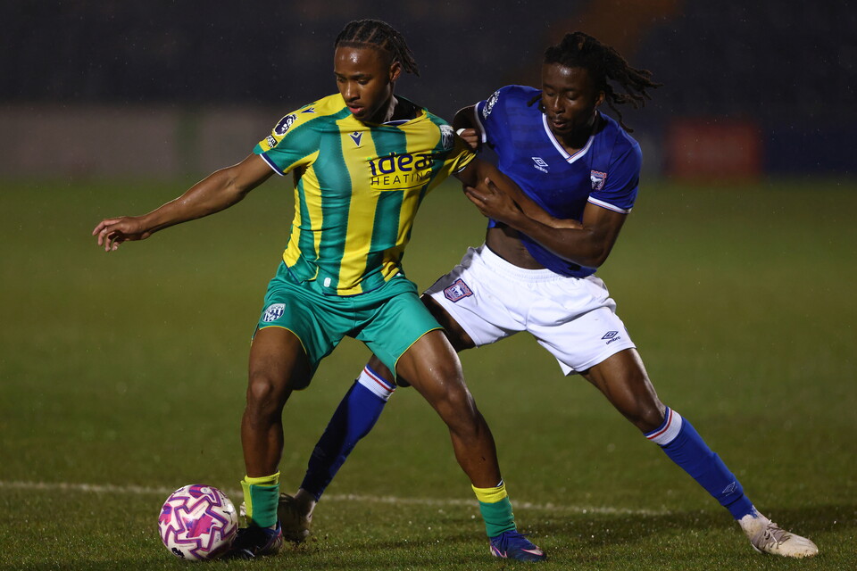 Remar McNeil in action against Ipswich Town.