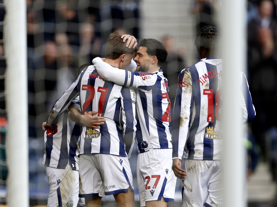 Isaac Price celebrates with team-mates after scoring against Hull City