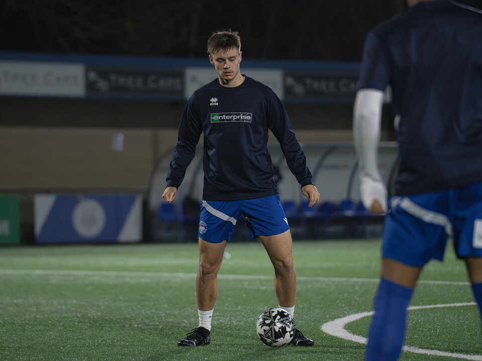 Evan Humphries warming up for Oxford City before a game 