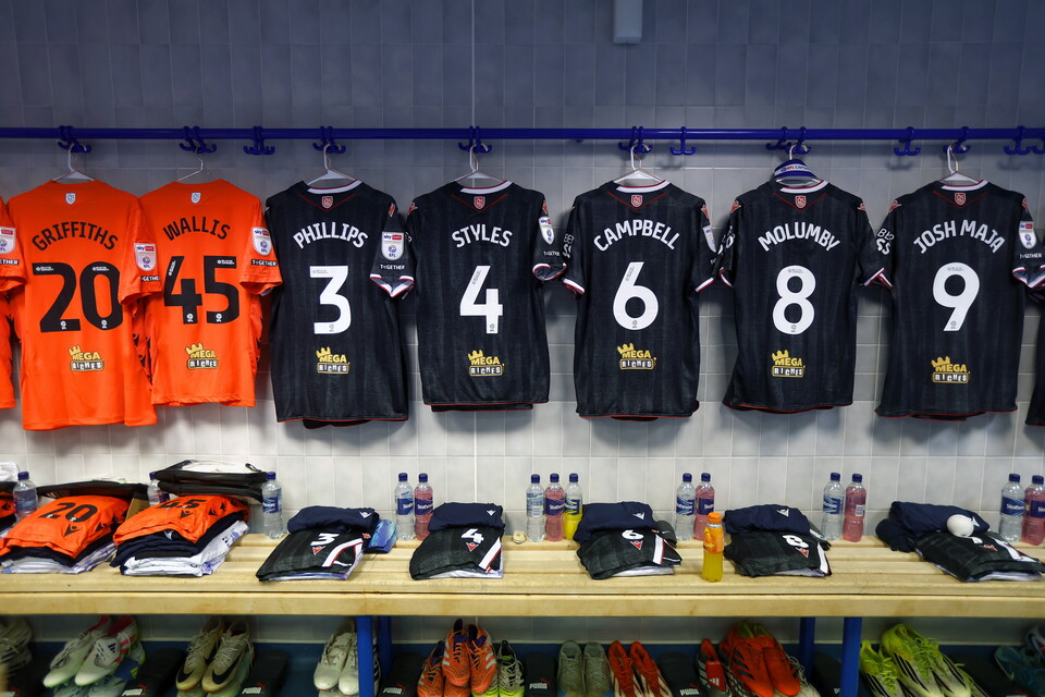 Shirts hanging up in the Albion dressing room