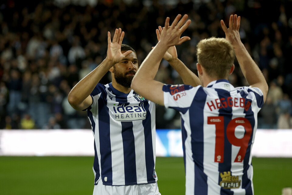 George Campbell and Aune Heggebo high five