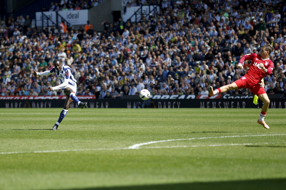 Ousmane Diakite has a shot against Ipswich