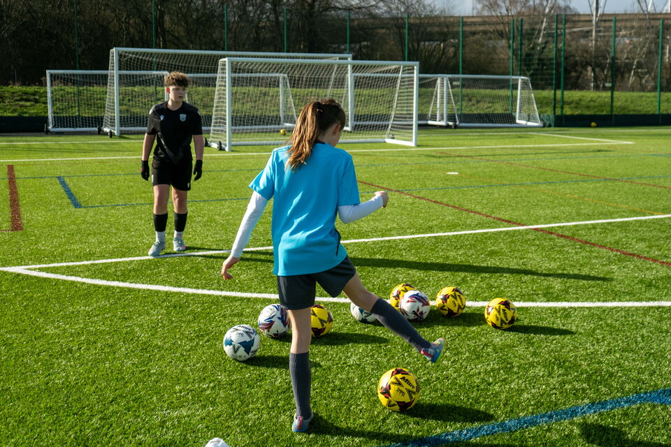 Participant showing a football skill