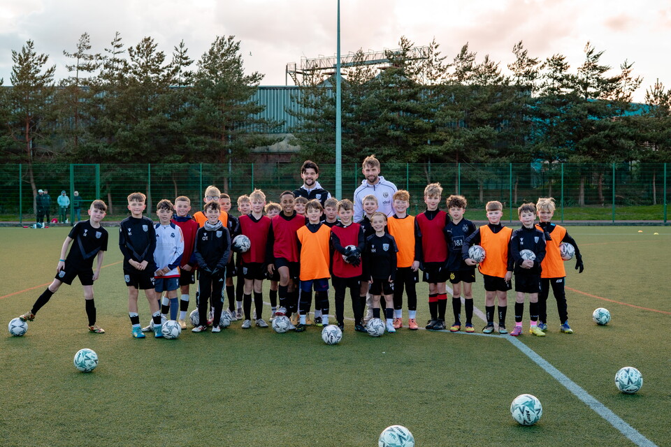 Alex Mowatt and Charlie Taylor in a group photo with The Albion Foundations PDA Group