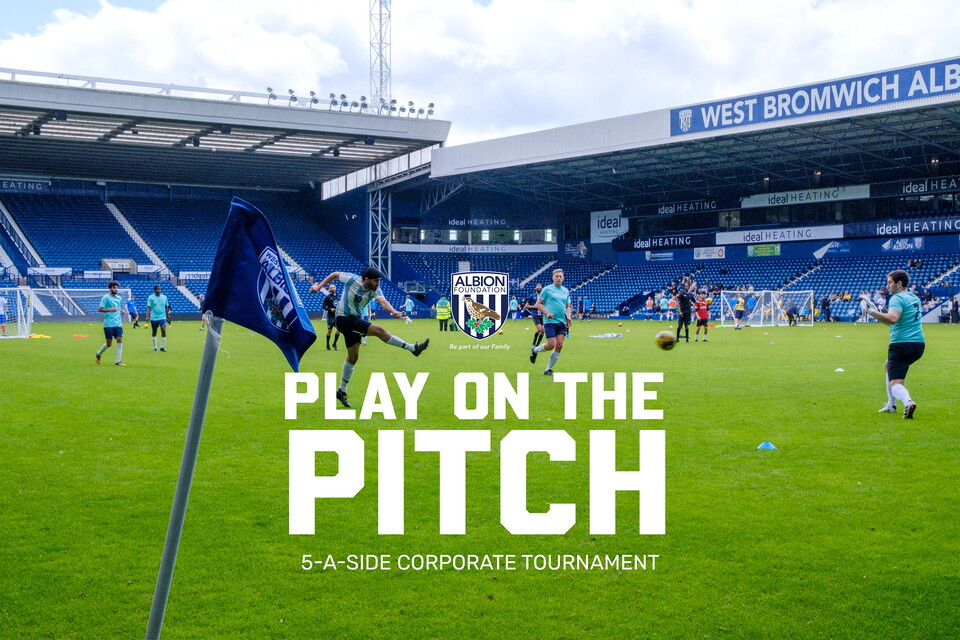 Players on the pitch with the West & Smethwick end stands in the background.