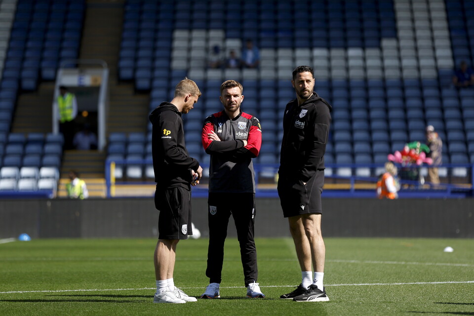 James Morrison, Leigh Downing and Damia Abella on the Hillsborough pitch