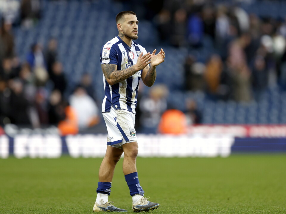 An image of Danny Imray applauding Albion fans