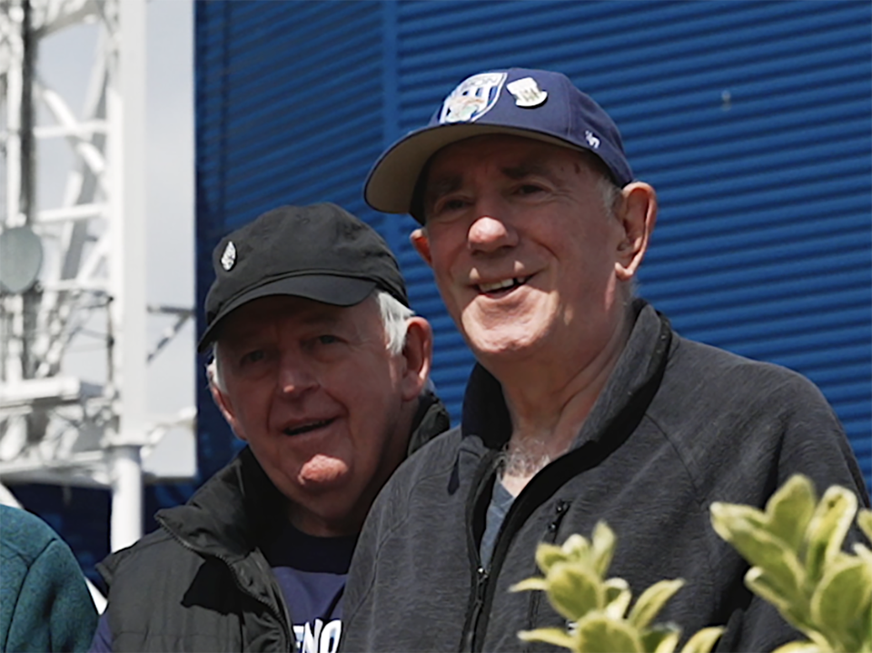 Allan Maull smiling next to another WBA memorial garden volunteer 
