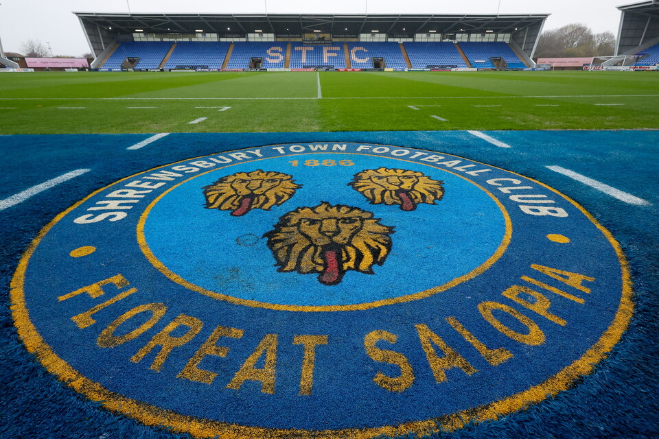 A general view of Shrewsbury Town's Croud Meadow stadium with a club badge on the floor 