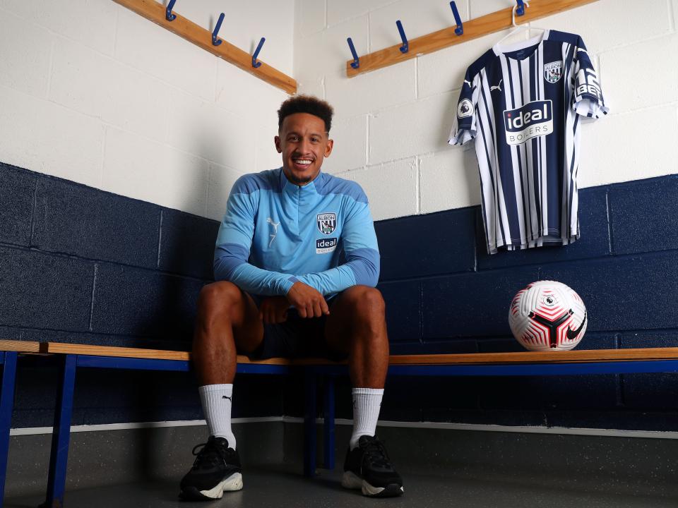 Callum Robinson poses for pictures after joining the Baggies permanently
