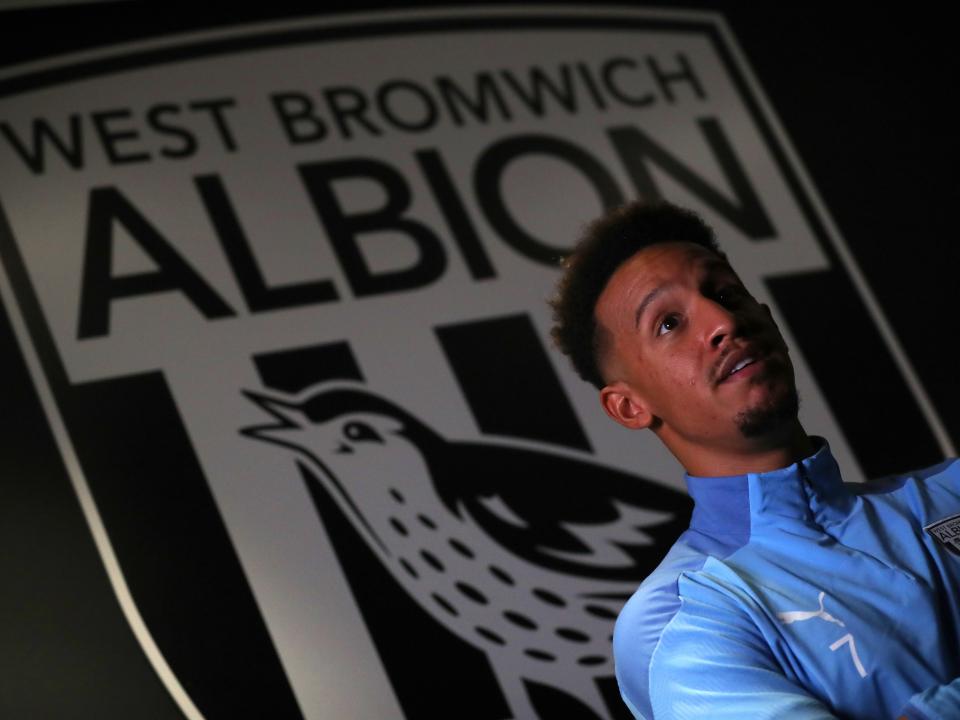 Callum Robinson poses for pictures after joining the Baggies permanently