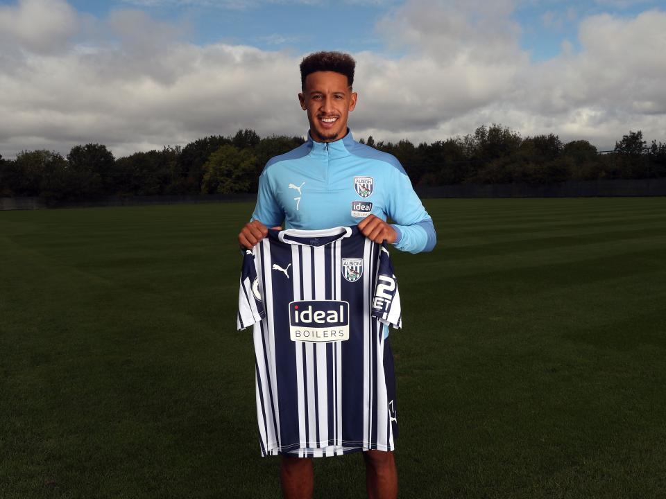 Callum Robinson signs