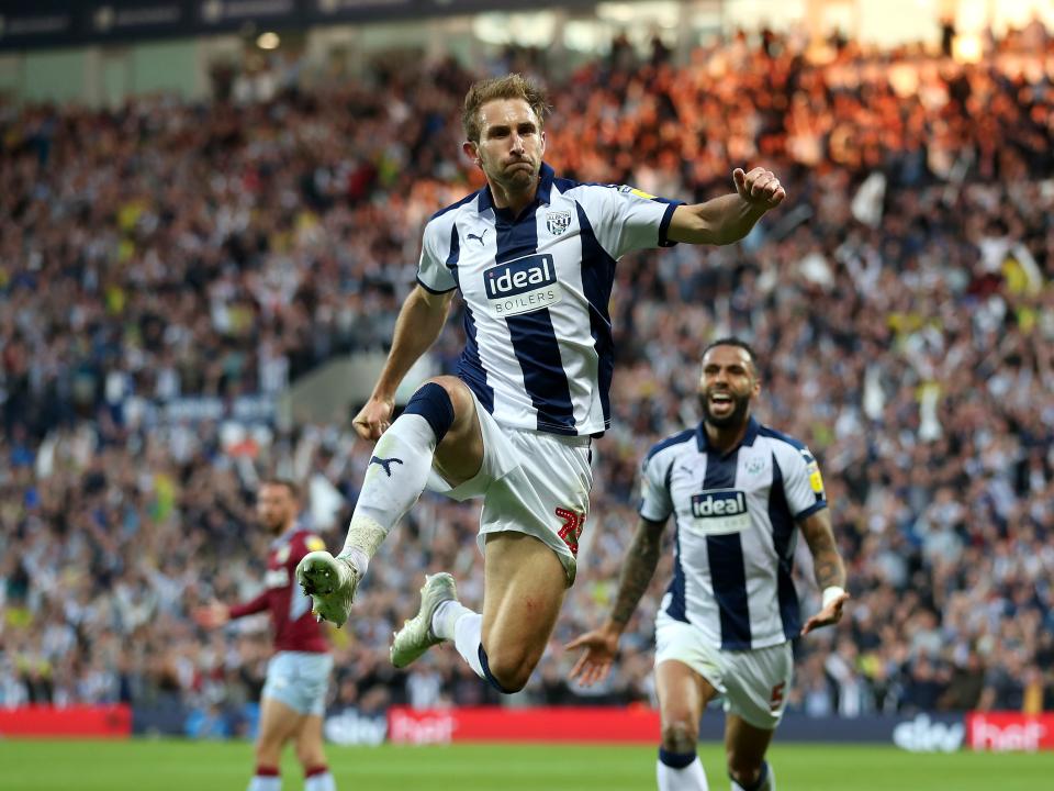 Craig Dawson celebrates