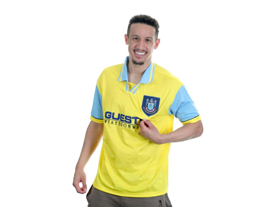 Callum Robinson wears 95-97 Away Retro