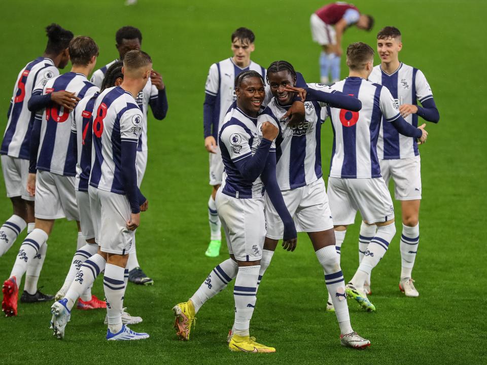 Albion's PL2 side celebrate at Villa Park after the first goal of the game.