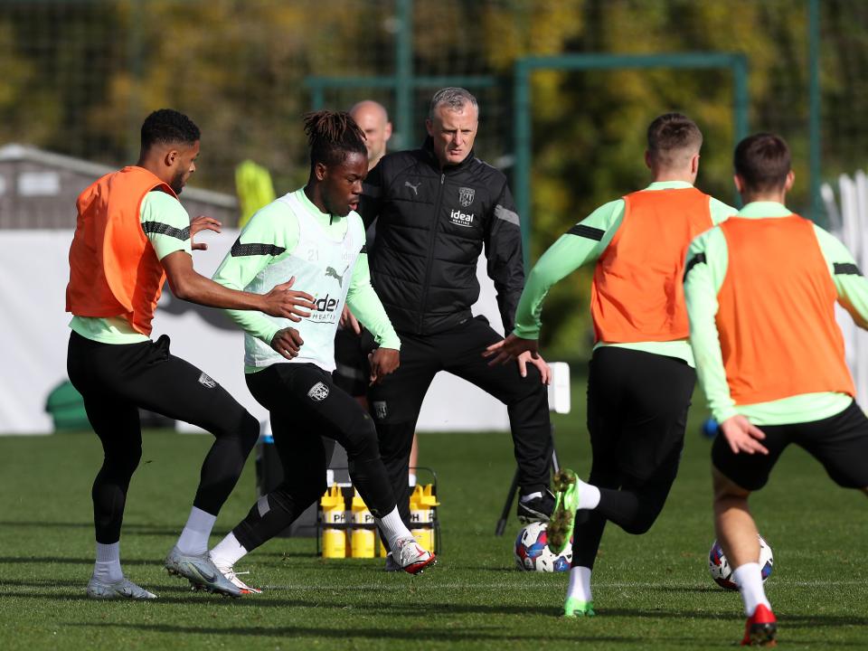 Darnell Furlong, Brandon Thomas-Asante and Richard Beale on the training pitch
