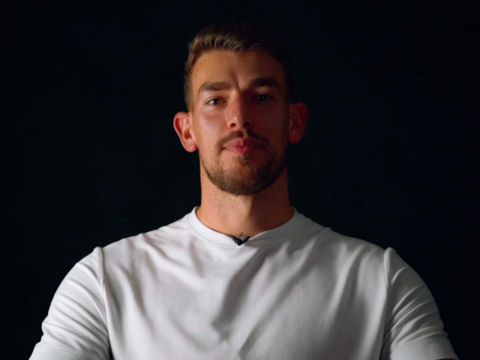 Alex Palmer sits in front of the WBA TV cameras