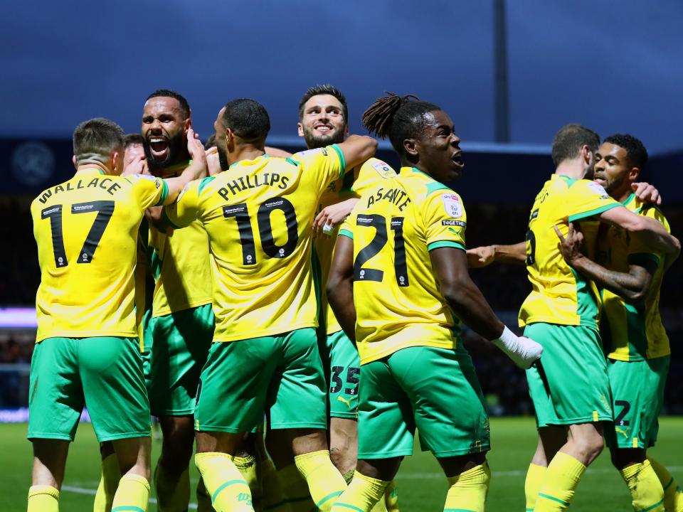 An image of Kyle Bartley celebrating with his teammates at QPR