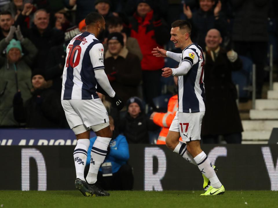 Matt Phillips celebrates with Jed Wallace after Wallace's goal against Rotherham