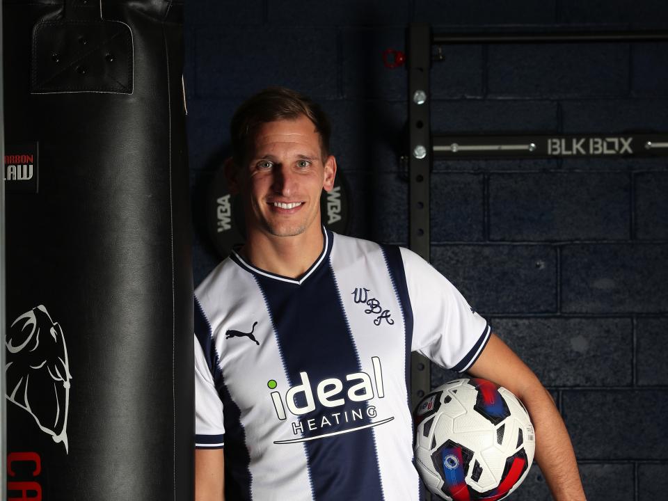 Marc Albrighton in a WBA shirt holding a ball