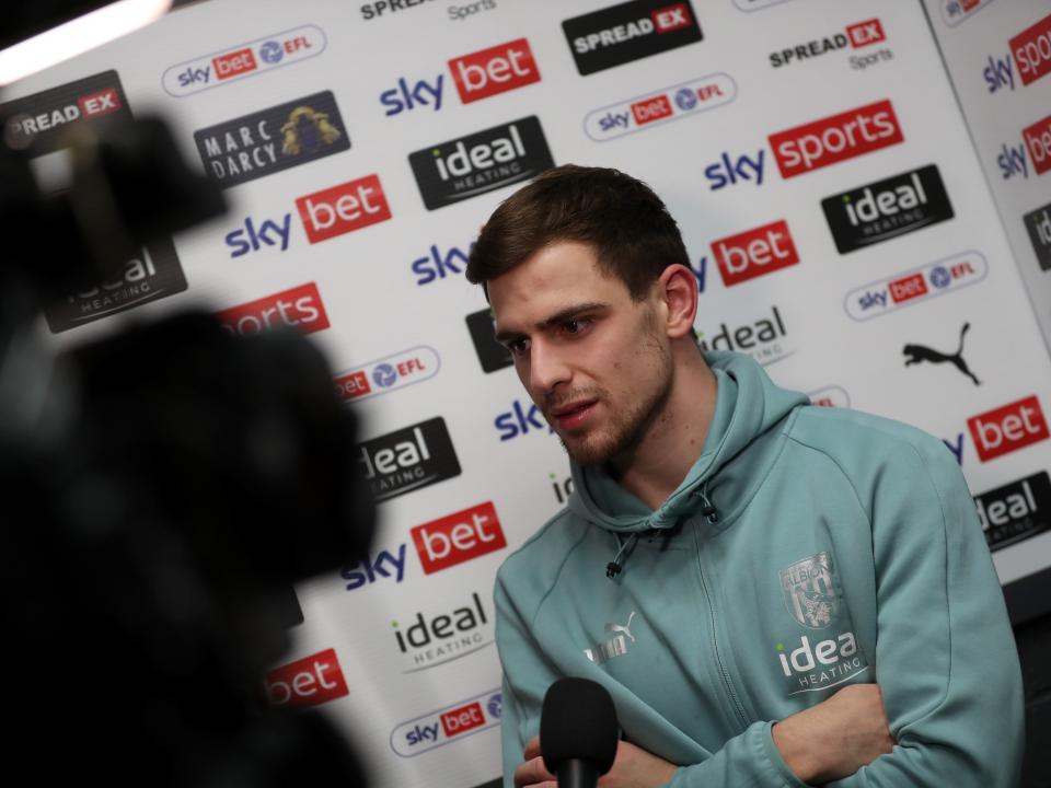 An image of Jayson Molumby talking to WBA TV