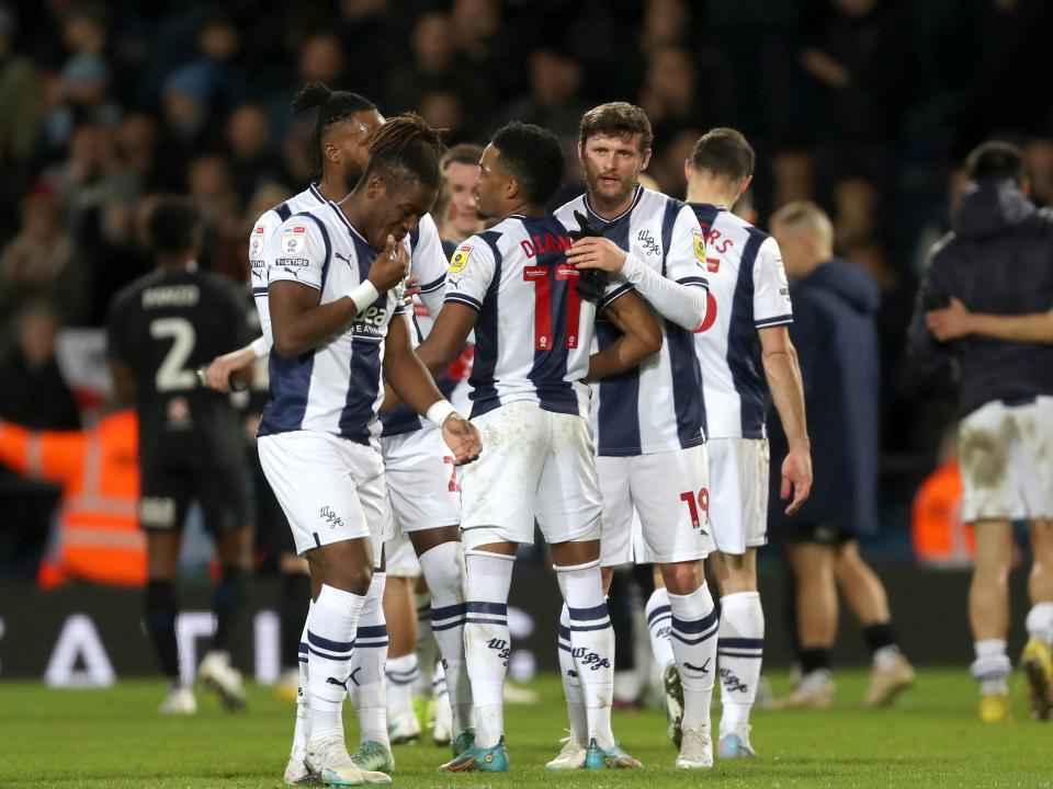 WBA players celebrate at full time following win over Coventry