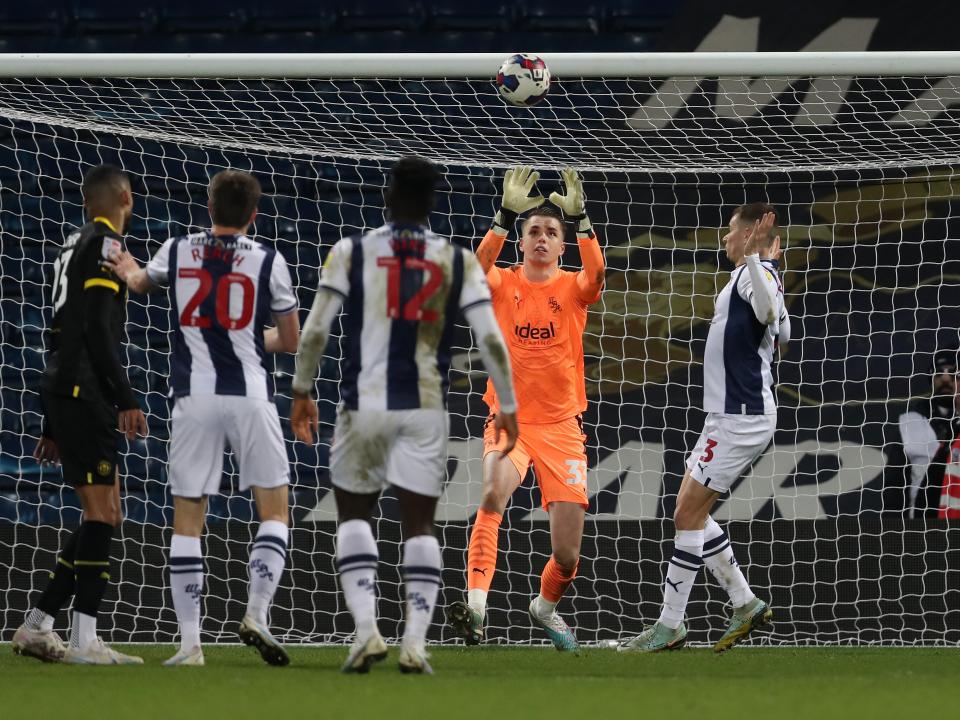 Josh Griffiths catches the ball against Wigan