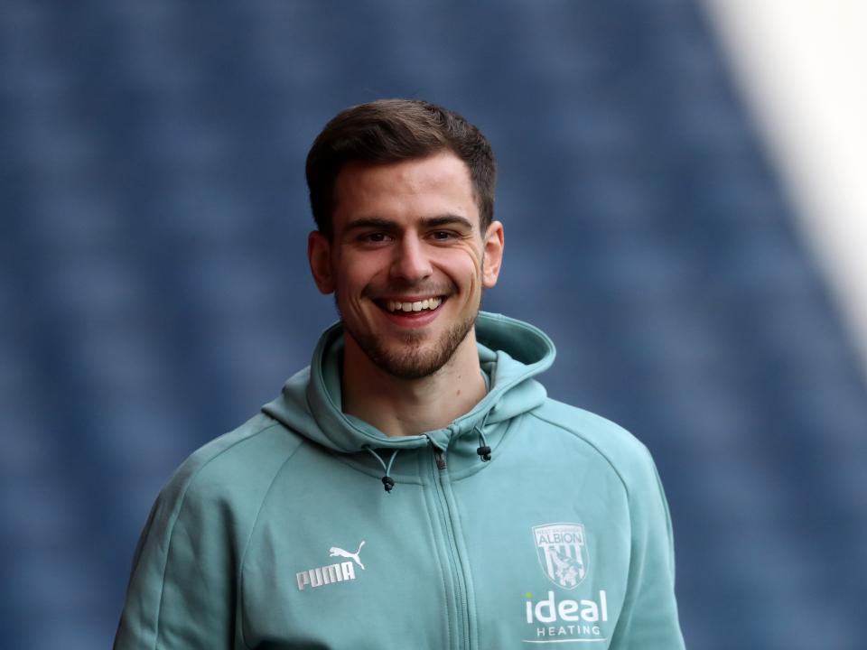 Jayson Molumby smiles at the camera at The Hawthorns