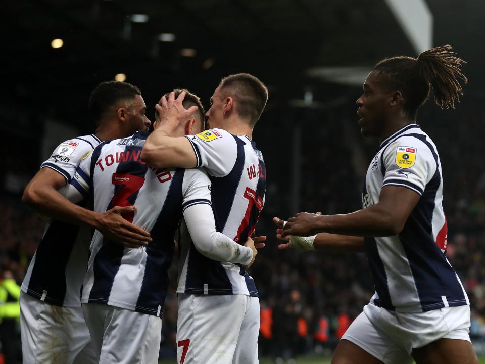 An image of Darnell Furlong, Conor Townsend, Jed Wallace and Brandon Thomas-Asante celebrating a goal