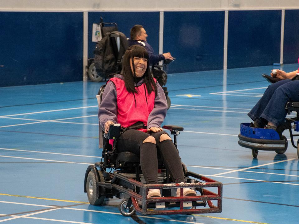 Team Building participant in a Powerchair
