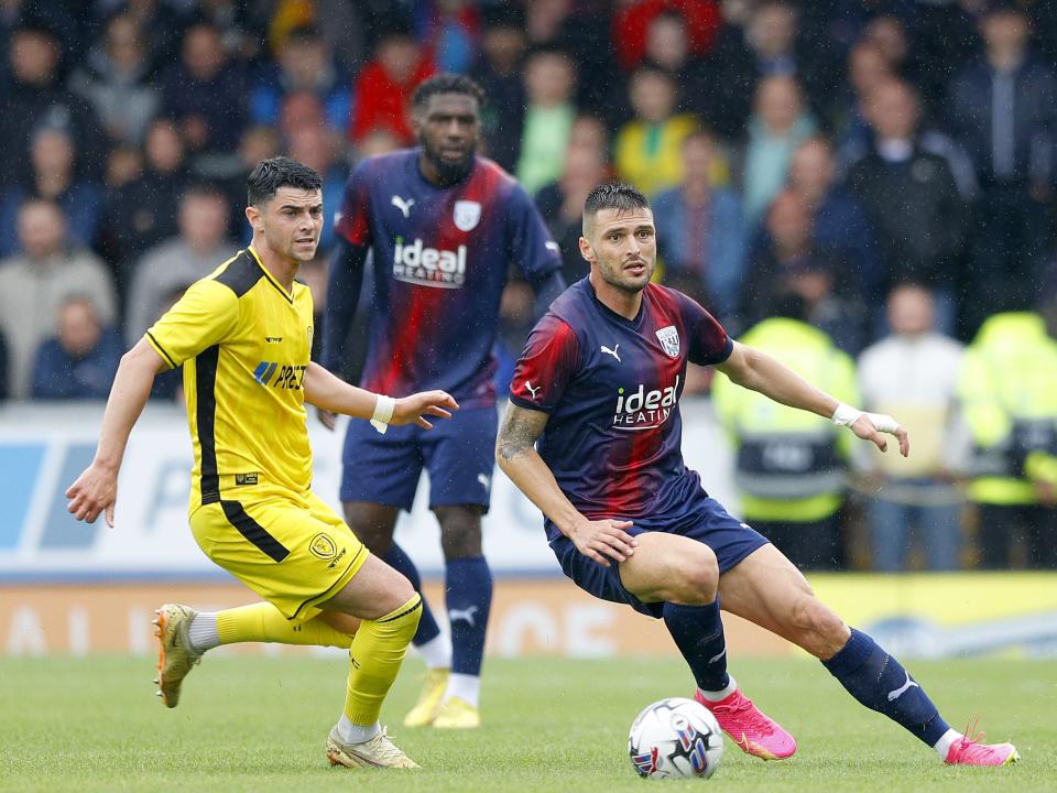 Okay Yokulsu in action against Burton