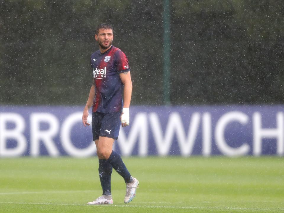 An image of Okay Yokuslu against Shrewsbury